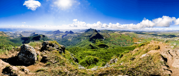 panoramic view showing port louis mountain ranges and sugar
