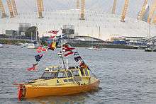 Jason Lewis of Expedition 360 pedaling his boat Moksha on the River Thames in London, shortly before completing the first human-powered circumnavigation of the Earth (2007)