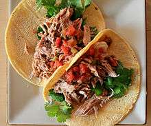 Tacos à la viande de porc (carnitas).