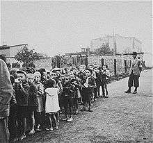 Rafle d'enfants conduits au train de déportation, Pologne.