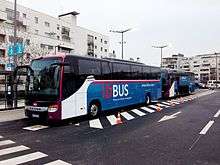 Car iDBUS Setra - au premier plan, et Irisbus au terminal de Paris-Bercy.