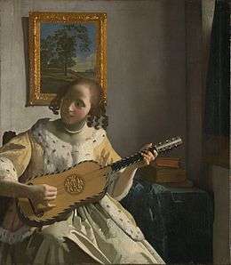 Joueuse de guitare par Johannes Vermeer (1632–1675)
