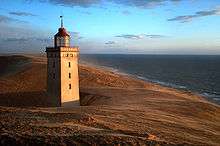 La progression des dunes : phare de Rubjerg Knude, ensablé et désaffecté, mer du Nord