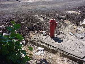 La création de la viabilité est un élément fondamental d'un lotissement.On voit ici les travaux de réalisation d'une rue et d'un piquet d'incendie.