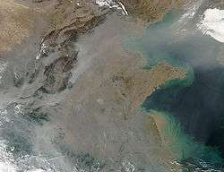 Fumée des feux et envol de millions de tonnes de poussières et aérosols issus des sols dégradés : Chine où dans certaines villes la pollution est quasi permanente