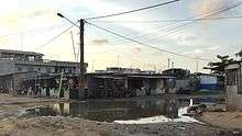 Les rues de Cotonou restent encore majoritairement faites de terre et sont peu praticables, notamment en saison humide - Quartier Avotrou. Octobre 2015.