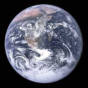"The Blue Marble" photograph of Earth, taken by the Apollo 17 lunar mission. The Arabian peninsula, Africa and Madagascar lie in the upper half of the disc, while Antarctica is at the bottom.